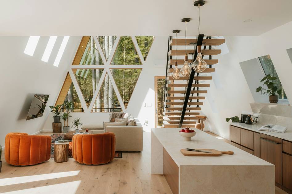 Bright open-plan living room in a modern coastal rental