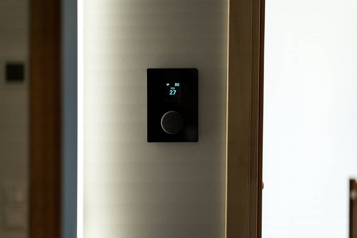 Screenshot showing step-by-step instructions for unlocking August smart lock and adjusting Ecobee thermostat settings via mobile app
